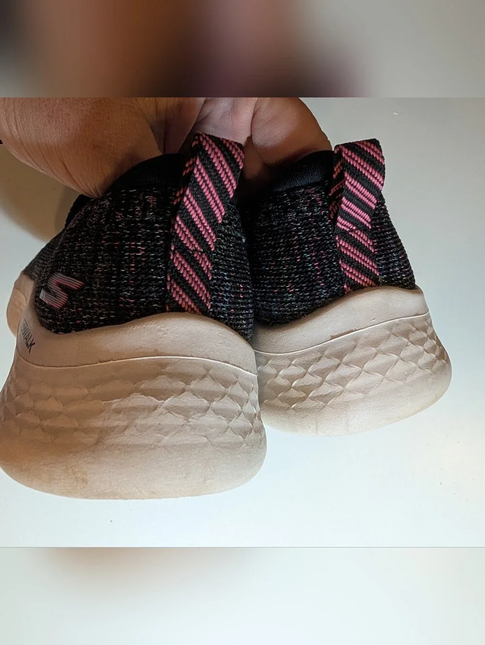 Skechers Slip-On Knit Sneakers in Black with Pink Accents